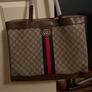 inspired tote bag. Brand new never used. Detachable pouch with zipper closure.